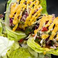 Keto Grilled Shrimp Tacos · Grilled shrimp,  guacamole, Chipotle aioli & shredded cabbage served on lettuce with sour cr...