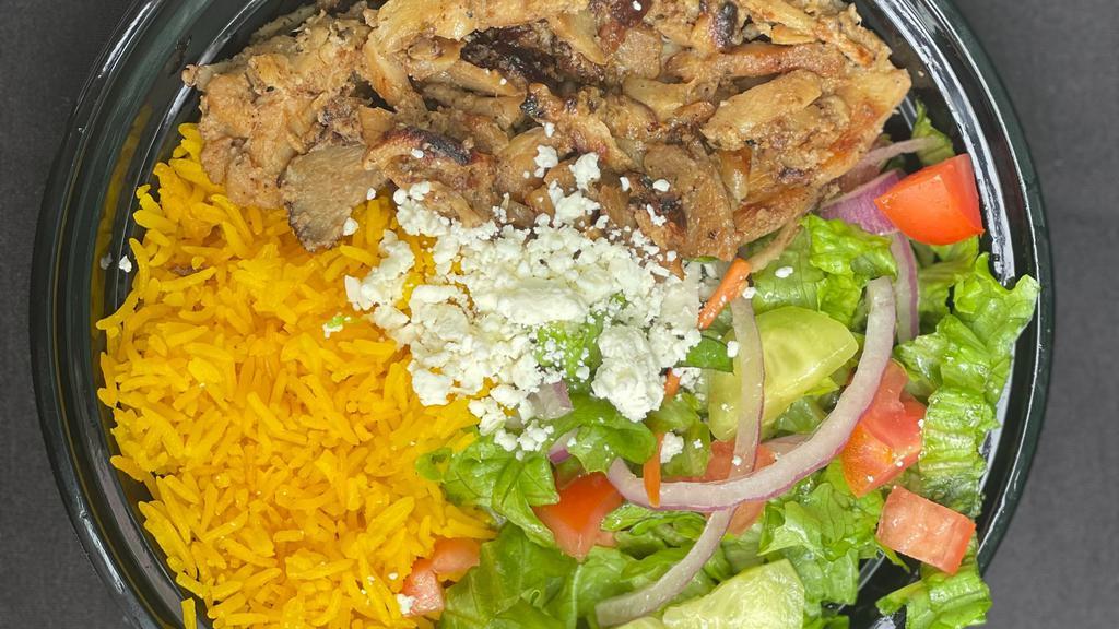 c. Beef, Lamb Mix Greek Bowl · Thin slices of beef and lamb mix, greek lemon  rice, lettuce, red onions, tomatoes, cucumber topped with tzatziki and spicy yogurt sauce & feta cheese