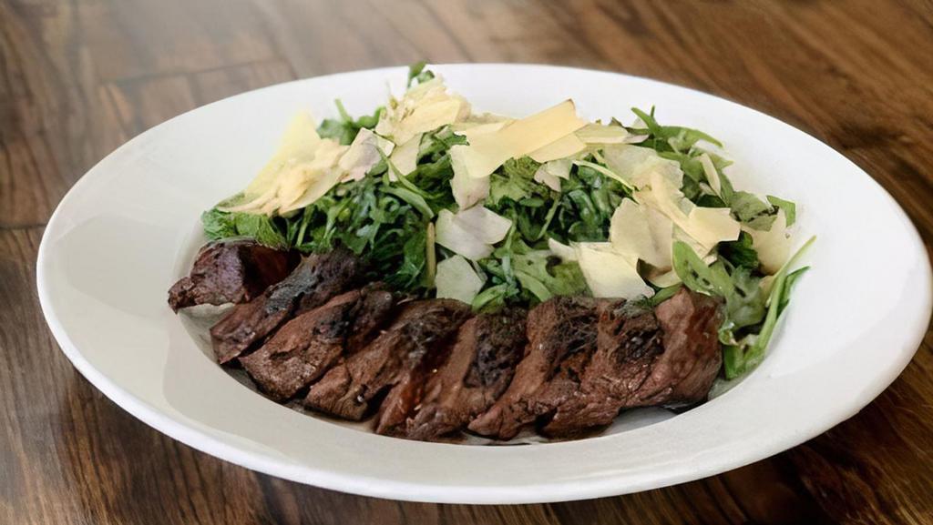 Steak Salad · Grilled steak, arugula mix, parmesan cheese, balsamic dressing.