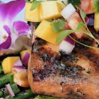 Grilled Salmon · Grilled salmon cooked to perfection with couscous, sauteed asparagus, and topped with a home...