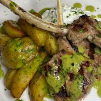 Lamb Chops · Four Grilled Lamb Chop served with roasted golden potatoes,  housemade tzatziki, topped with...