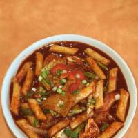 A7. Dduk Bok Gi · Spicy. Sautéed rice cake with vegetables and spicy sauce.