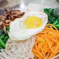 18. Bi Bim Bab · Fresh seasoned vegetables and fried egg over rice.