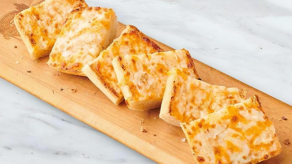  Cheesy Garlic Bread · Melted Mozzarella,  sharp Cheddar and  Parmesan top a split toasted Ciabatta roll spread with garlic aiolo & garlic butter