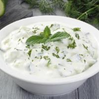 Side of Yogurt Salad · Fresh Mediterranean classic yogurt salad.