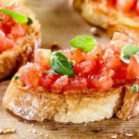 Bruschetta di Pomodoro · Chopped tomatoes with EVOO and balsamic vinegar reduction. 
EVOO: Extra Virgin Olive Oil
