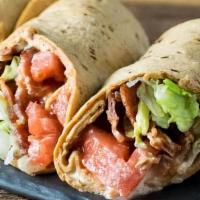 BLT Burrito · Bacon, lettuce, tomatoes and cheese topped with house Caesar dressing wrapped in a crispy fl...