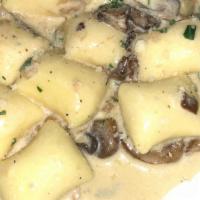 Gnocchi al Tartufo
 · Mushroom truffle cream sauce.