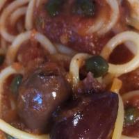 Spaghetti alla Puttanesca · Anchovies, capers, olives in  marinara sauce (mild spice)