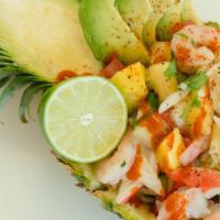 Piña Del Mar · ceviche mixed with diced pineapple and mango, freshly squeezed orange juice, mango nectar, t...