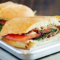 Napa Chicken Sandwich · Sliced grilled chicken breast melted with Swiss cheese, bacon, sweet caramelized balsamic on...