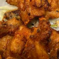 House chicken wings 6 pcs · Deep fried marinated chicken wing lollipop