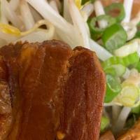Miso pork belly ramen · Come with pork belly, bean sprout, bamboo,half slow cook egg, green onion, request add fresh...