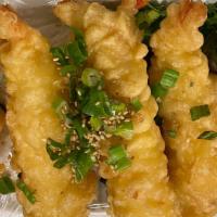 Curry tempura shrimp over rice · 5 pcs tempura shrimp, free miso soup and green salaf