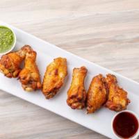 Z Wings · All-natural chicken wings (8 pcs) hand-tossed in your choice of sauce BBQ, Buffalo, Korean B...