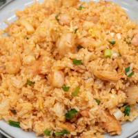 Kimchi Fried Rice · Fried rice w/ kimchi, shrimp, fried egg over rice
