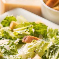 Caesar Salad · Hearts of Romaine, croutons, shredded parmesan cheese.
