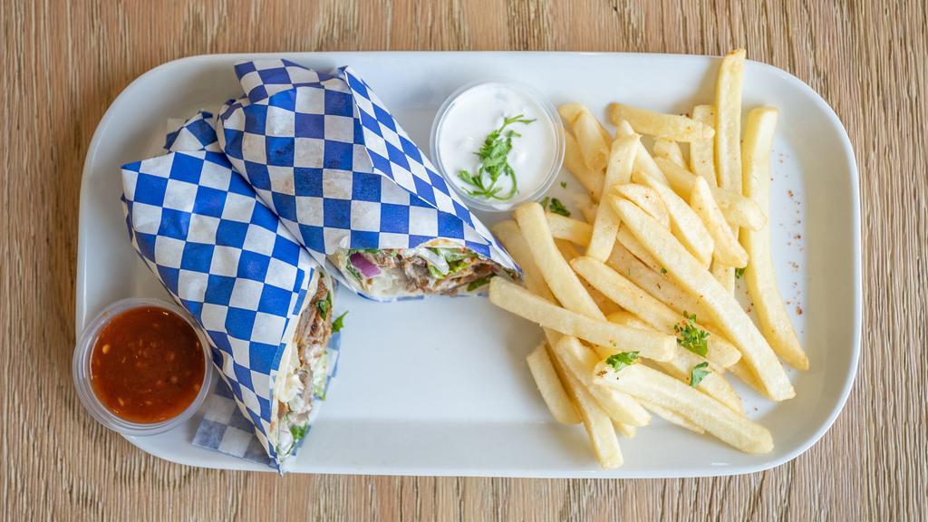 Gyro Wrap · Lamb & Beef wrapped with lettuce, tomatoes, onions and SAM's Tzatziki sauce.