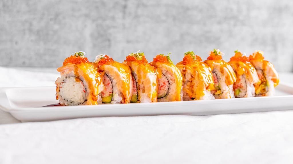 Lion King · Baked California roll topped with salmon, tobiko with spicy mayo.