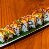 King of Hamachi · Deep fried yellow tail topped with seared yellow tail, scallion, mayo, onion and tobiko.