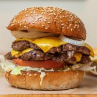 Double Cheeseburger · 100% grass feed beef served on a locally baked sesame seed bun with lettuce, tomato, onion a...