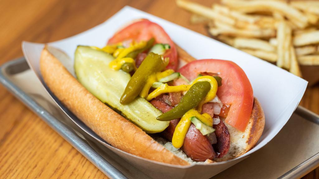Chicago Dog · Neiman ranch 100% all-beef. Served with relish, onions, tomato, cucumbers, pickle, sport peppers, celery, salt and mustard.