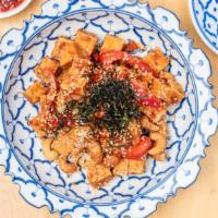Tofu Choo Ros · Spicy. Crispy diced tofu with fresh chili, garlic, cashew nuts, bell peppers and sesame seed...