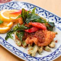 Pla Sam Ros · Spicy. Deep fried fillet of red snapper with fresh chili sauce, garlic, bell peppers and cri...