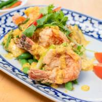 Yellow Prawns · Lightly fried jumbo prawns with garlic, onions,bell peppers mixed in a light yellow curry sa...