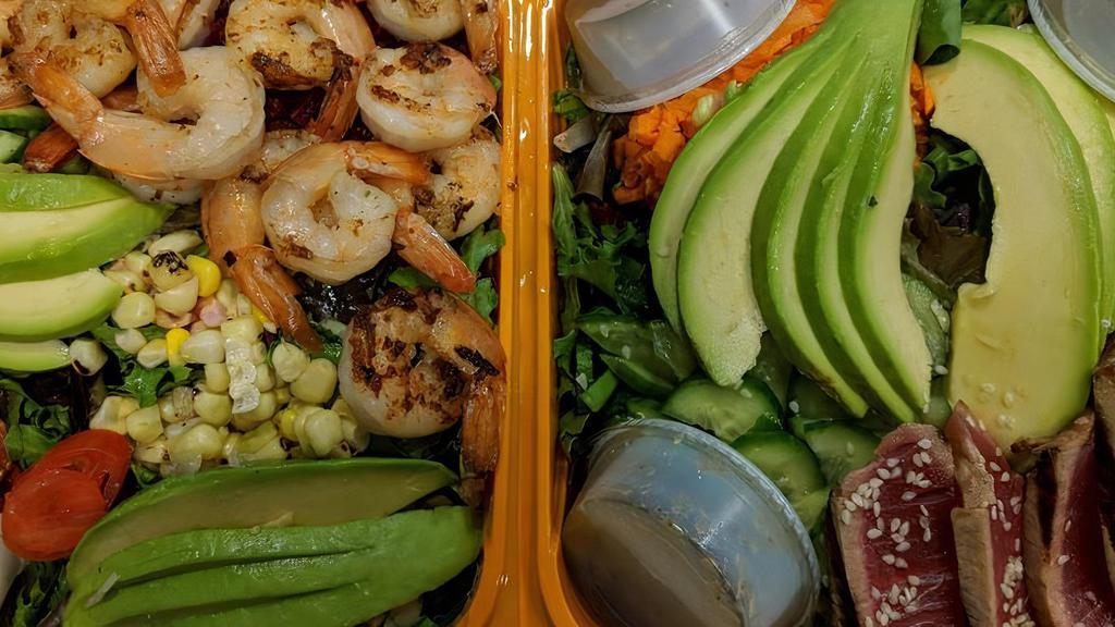 11. Shrimp & Avocado Salad · Organic baby field greens, grape tomatoes, fire roasted corn, baked beets, marinated grilled shrimp, and hass avocado, served with lemon herb dressing.