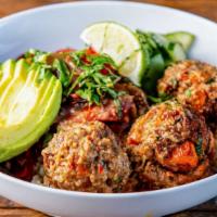 Thai Impossible Meatball Bowl · Impossible meatballs with peanut sauce, caramelized onions, avocado, charred peppers, cucumb...