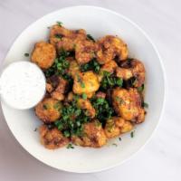 Peanut Butter Cauliflower Wings · Gluten-free, vegan cauliflower wings tossed in our Peanut sauce and served with housemade ve...