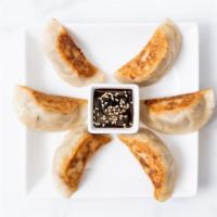 Sweet Potato Potstickers · Gluten-free potstickers filled with sweet potato, fresh garlic, and fresh ginger. Pan fried ...