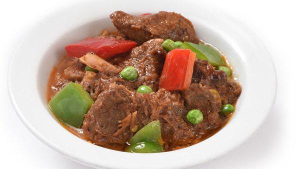 Beef Kaldereta · Classic Filipino beef stew cooked in tomato sauce, liver spread, bell peppers, and spices.