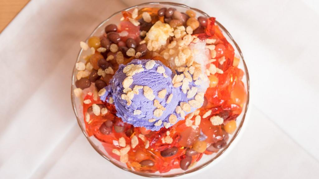 Halo-Halo Special · A Filipino dessert made with  mixed sweet beans, gelatin, coconut jelly, purple yam, topped with milk, crushed ice and ice cream.