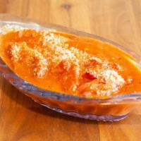 Butter Chicken · Yogurt and spice marinated chicken dressed butter, coconut based creamy tomato sauce herbes ...