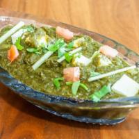 Saag Paneer · Indian cheese cooked with spinach & mustard greens with spices, herbs & touch of cream.