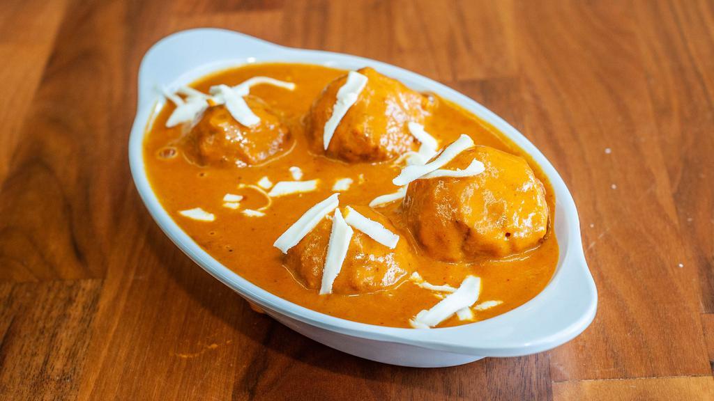 Malai Kofta · Malai Kofta is a classic North Indian dish which has deep fried paneer and vegetable dumplings (kofta) in rich and creamy tomato gravy.