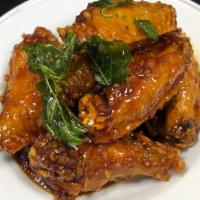 8 Angel Wings · Crispy wings sautéed with house special sauce.