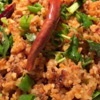 12 Nam Kao (Crispy Rice Salad) · Crispy rice with ground pork, shredded coconut, cilantro, peanuts, green onion, mint, and cr...