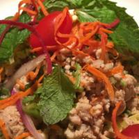 11 Chicken (larb) Salad · Minced chicken with onions, mint leaves, roasted chili, rice powder, and lemon juice dressing.