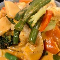 43 Red Curry · Medium spicy curry with chicken OR beef OR tofu OR prawns, basil, bamboo shoot, red bell, an...