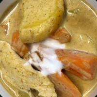41 Yellow Curry · Mild curry with chicken OR prawns OR mix veggies, turmeric, fresh herbs, spices, coconut mil...