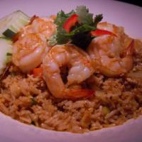 51 Thai Style Fried Rice · Fried rice with egg, tomatoes, and onions. Choice of chicken, beef or tofu, crab meat, OR pr...