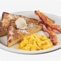 French Toast Combo · Two slices of thick, egg-washed cinnamon bread served with syrup and powdered sugar, plus yo...
