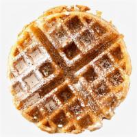 Belgian Waffle · One large Belgian-style waffle topped with butter, syrup, and powdered sugar.