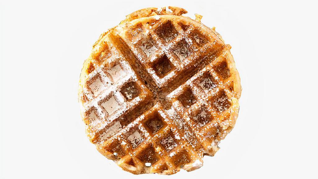 Belgian Waffle · One large Belgian-style waffle topped with butter, syrup, and powdered sugar.