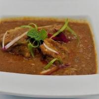 HYDERABAD GOAT MASALA · Succulent pieces of goat in masala sauce