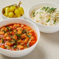 Bean Stew (V) · Traditional Turkish bean stew cooked with onion and pepper paste. Served with jasmine rice w...