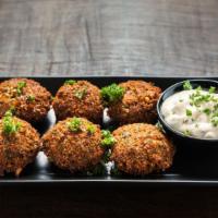 Falafel (5 Pieces) · Our house-made falafel patties (5 Pcs) made with chickpeas, herbs and our special seasoning ...